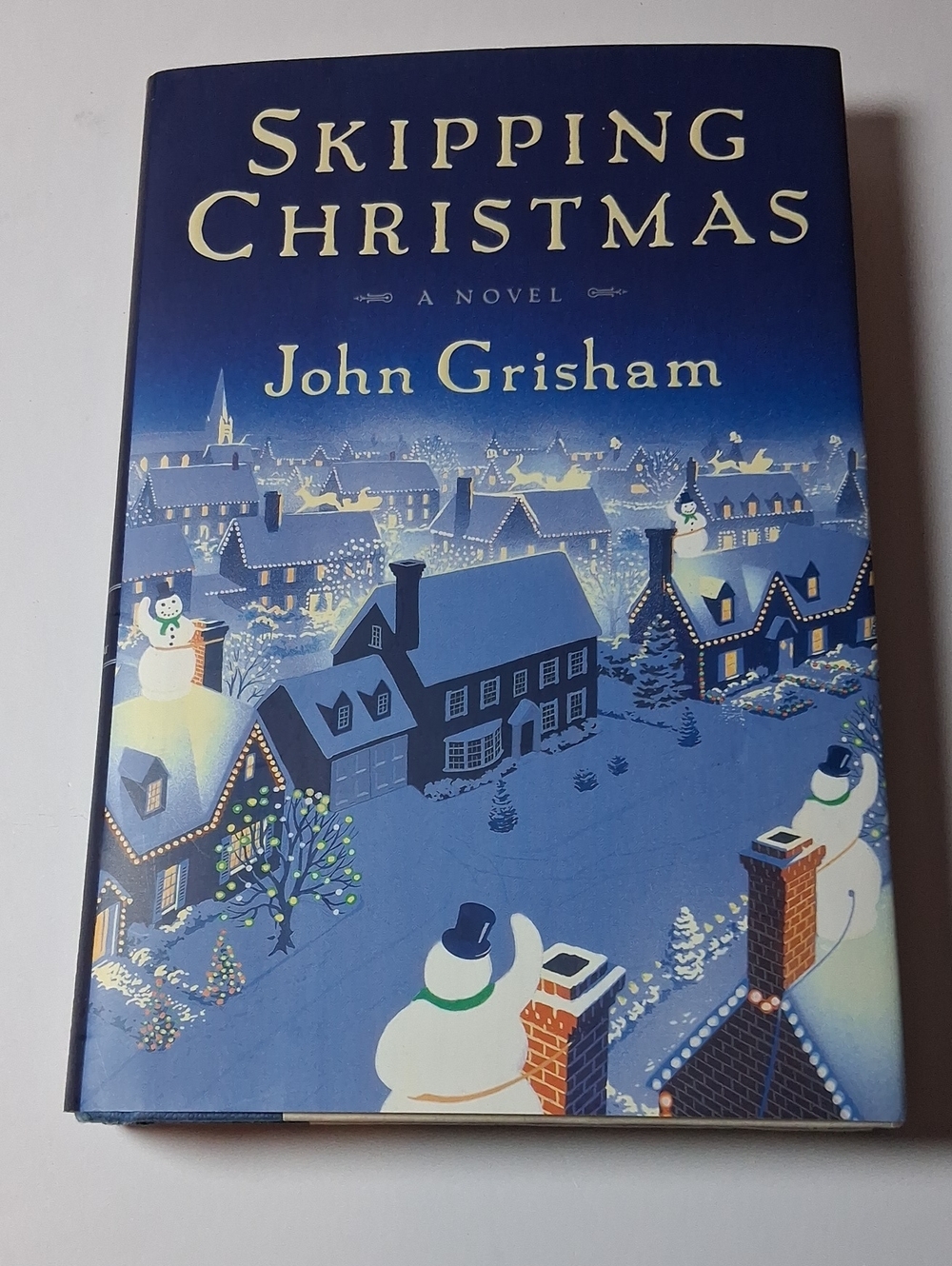 John Grisham Skipping Christmas Hardcover - Blue Holiday Cover